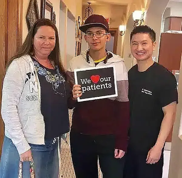 Happy patients at Precision Dental Care