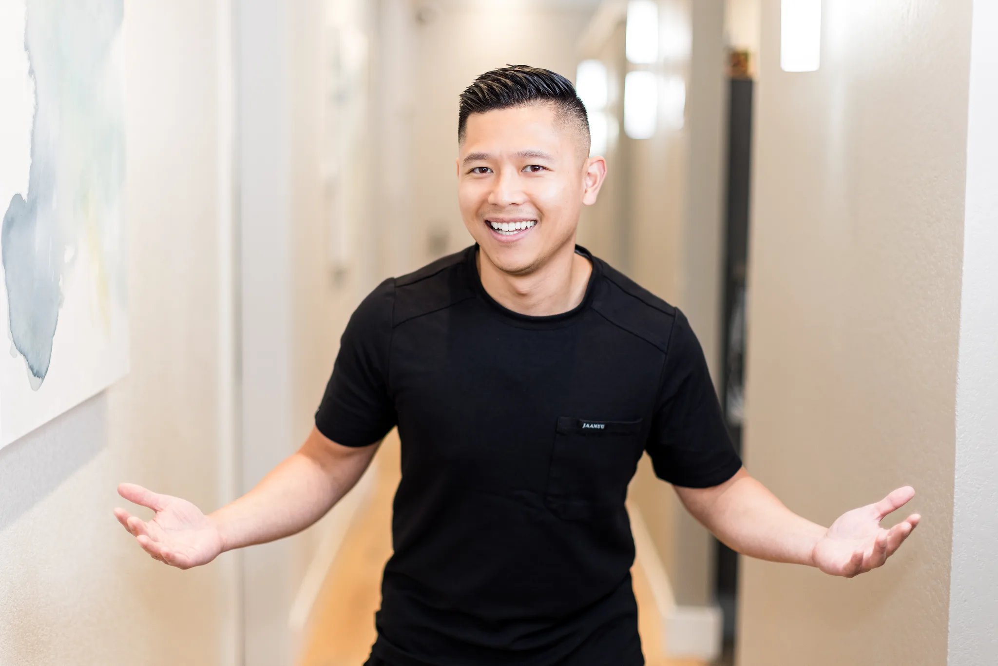 Dr. Michael Nguyen in the practice hallway at Precision Dental Care